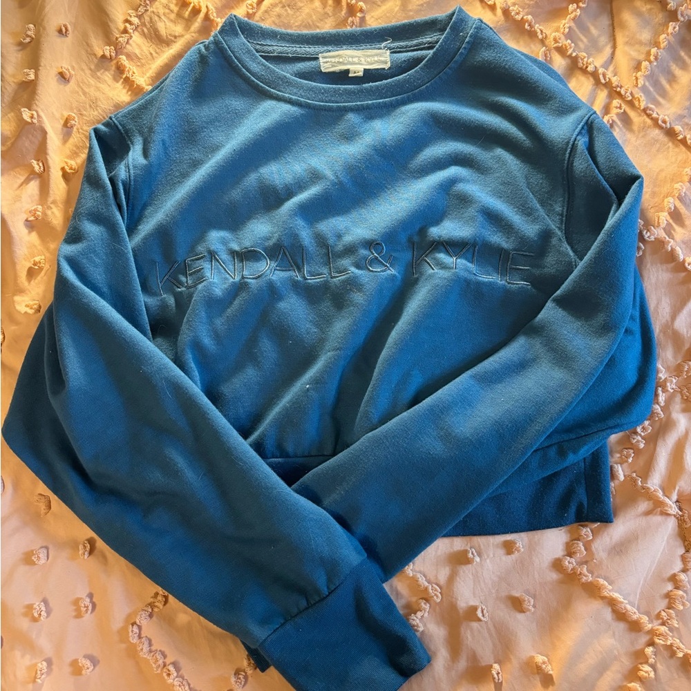 $15• Kendall and Kylie blue long sleeve crop top